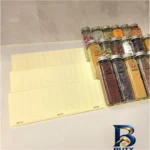 نمای بسته بندی استند ادویه و جا مک کارتی مدل ژینوس برچسب و بسته بندی
