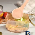نمای کناری قابلمه پیرکس با در خرسی و دستگیره فلزی پروفایل و ساختار