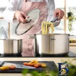 نمای جلو سرویس قابلمه استیل ۷ پارچه وول مدل ST-SET۰۰۲ اصل برچسب کیسه و وزن