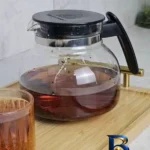 نمای بسته بندی قوری پیرکس هپی هوم مدل HH-۱۱۰۰ ظرفیت ۱۱۰۰ میلی لیتر اصل برچسب و بسته بندی