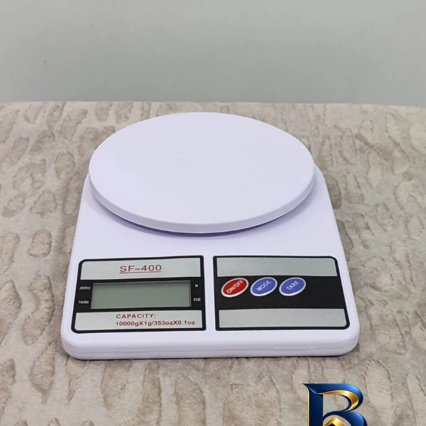 نمای بسته بندی ترازو آشپزخانه دیجیتال مدل New Electronic SF ۴۰۰ حداکثر ظرفیت قابل اندازه گیری ۱۰ کیلوگرم با دقت ۱ گرم اصل برچ