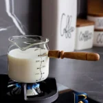 نمای بسته بندی شیرجوش مدل چوبی ۵۰۰ اصل برچسب و بسته بندی