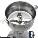 نمای جزئیات آسیاب صنعتی ۸۵۰ وات ۱۵۰ گرم مکسی مدل GRIND-۱۵۰ اصل نمای نزدیک بافت مغزها