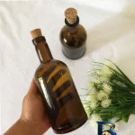 نمای بسته بندی بطری در دار مدل کد 712 مجموعه 2 عددی برچسب و بسته بندی