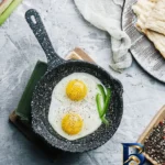 نمای جزئیات تابه چدنی نالینو مدل Unica با روکش دیسکاور پرداخت و جزئیات مواد