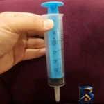 نمای بسته بندی سرنگ غذای کمکی طوطی سانان مدل B۱۰۹ بسته ۱۴ عددی اصل برچسب و بسته بندی