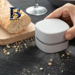 مینی جارو شارژی دستی مدل BTC۱-۰۱۱ با باتری لیتیوم یونی ۱۰۰۰ میلی آمپرساعت، موتور ۳.۷ وات و مخزن قابل جداسازی اصل